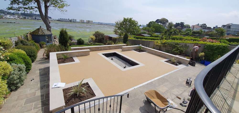 sand resin patio with plant beds